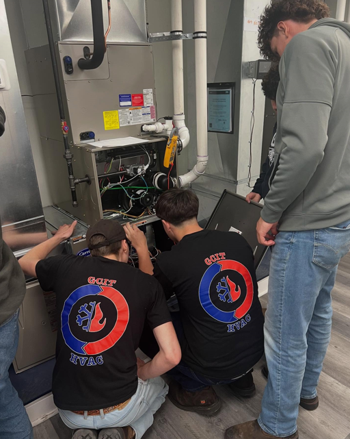 bovio rubino tech center working on ac unit